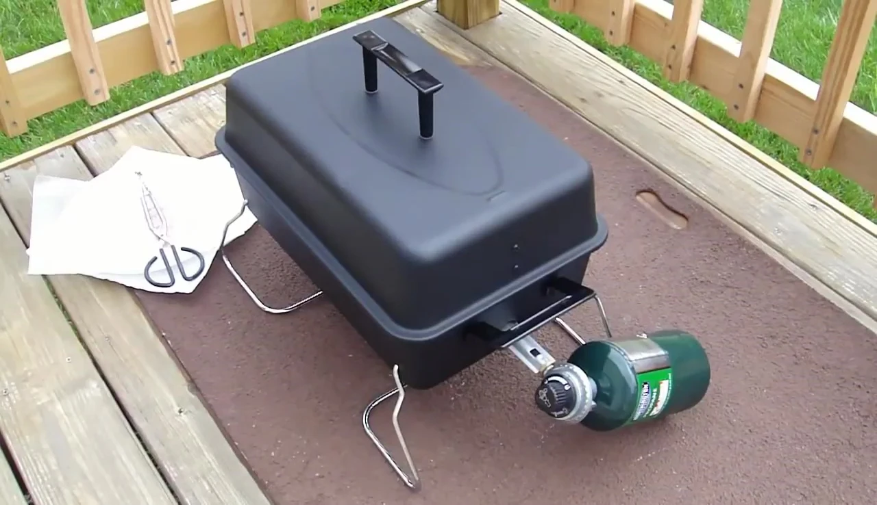 Close-up of the assembled grill with the propane tank installed.