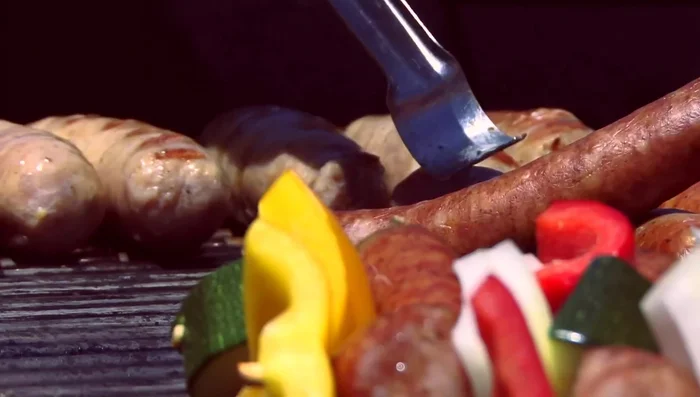 Monitor and adjust: Rotate sausages every 2-3 minutes to prevent burning. Close the grill lid periodically to maintain even heat, especially in windy conditions.