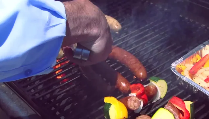 Check for doneness: Sausages are ready when they have nice grill marks and are cooked through. Corn is ready when it has grill marks and is slightly charred. Vegetables should be tender-crisp.