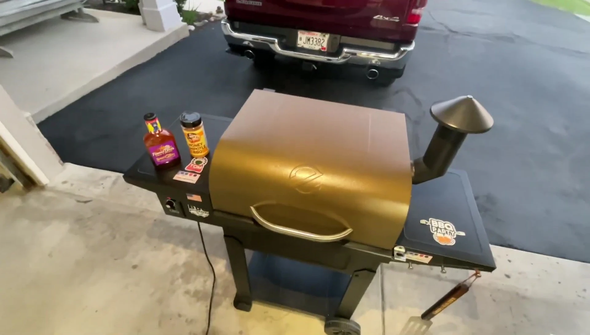 Checking the temperature of the grill grates.