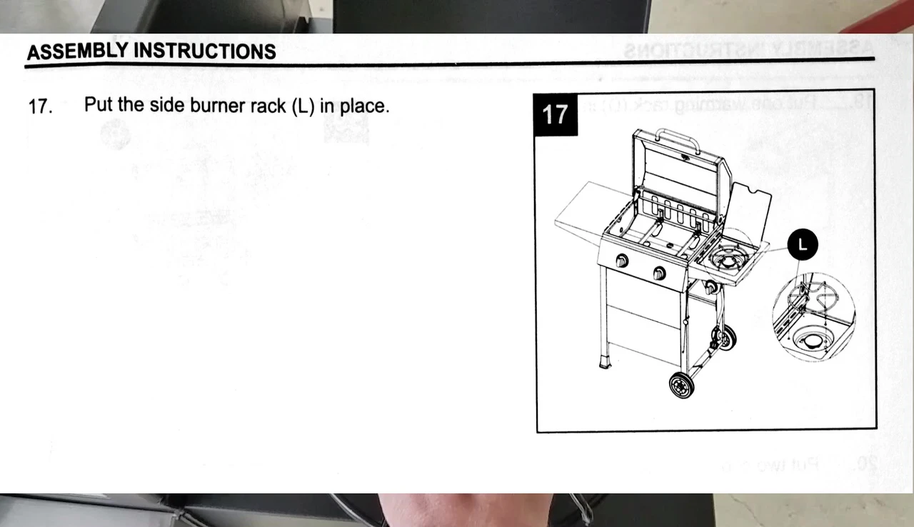 Installing the side burner rack.
