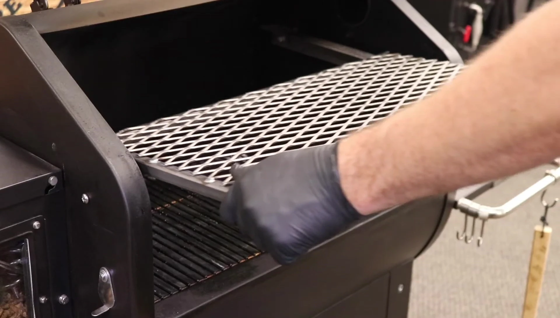 Demonstration of installing and removing the top shelf.