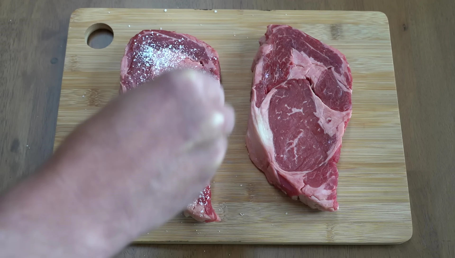 The steaks are seasoned with kosher salt