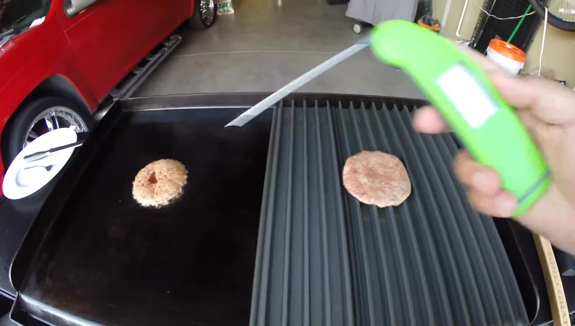 Temperature check of the burger patty cooked on the Grill Grates.