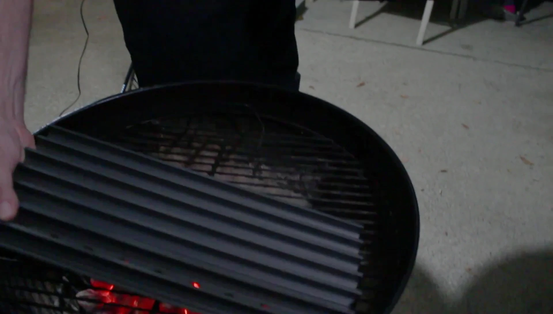 GrillGrates positioned on the Weber grill.