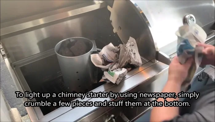 Fill the chimney with charcoal, not exceeding the top rim.