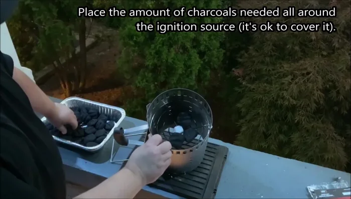 Place charcoals around the ignition source.