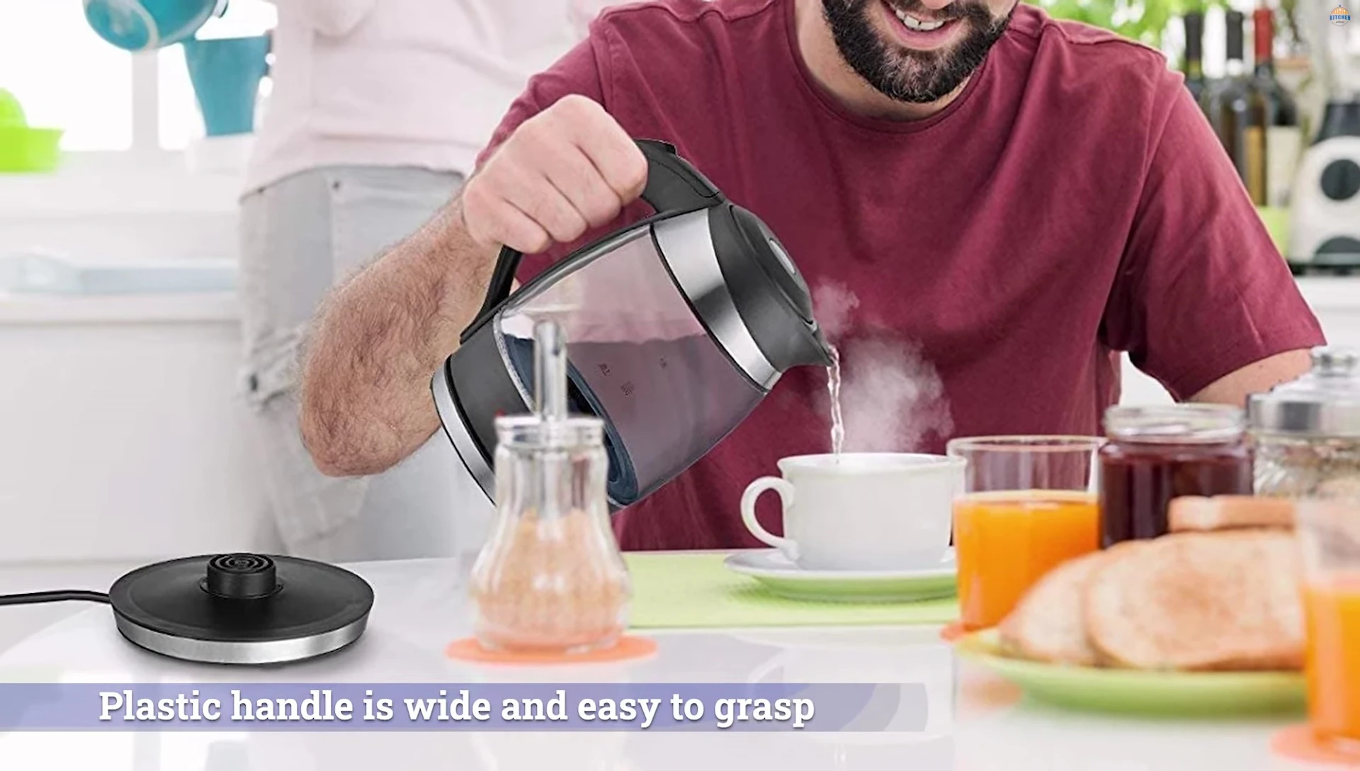 Close-up showcasing the Mueller's handle and spout.