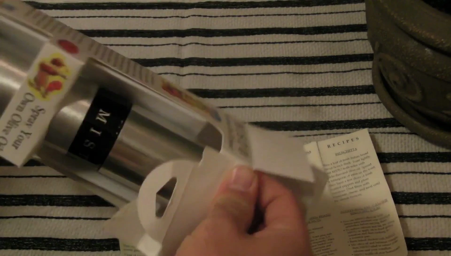 The Misto olive oil sprayer and instruction booklet.