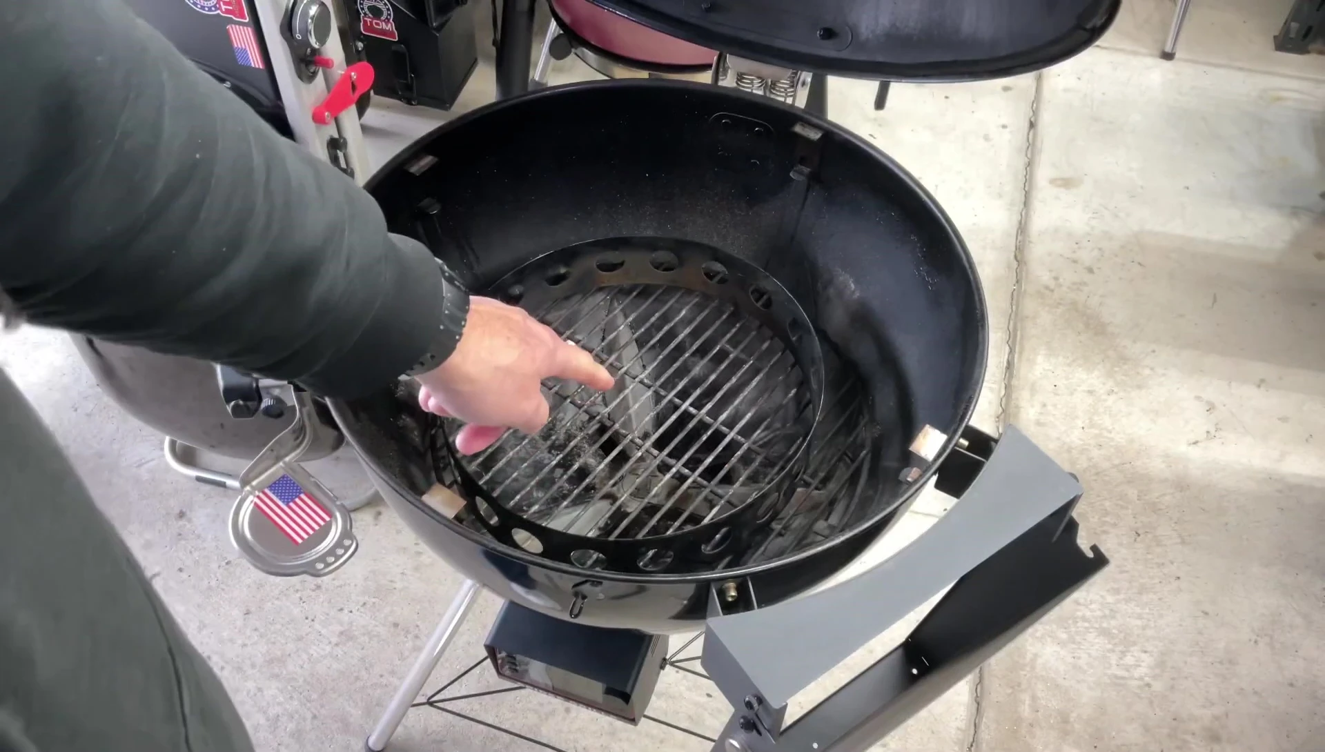 Close-up of the original Weber heat diffuser and charcoal basket