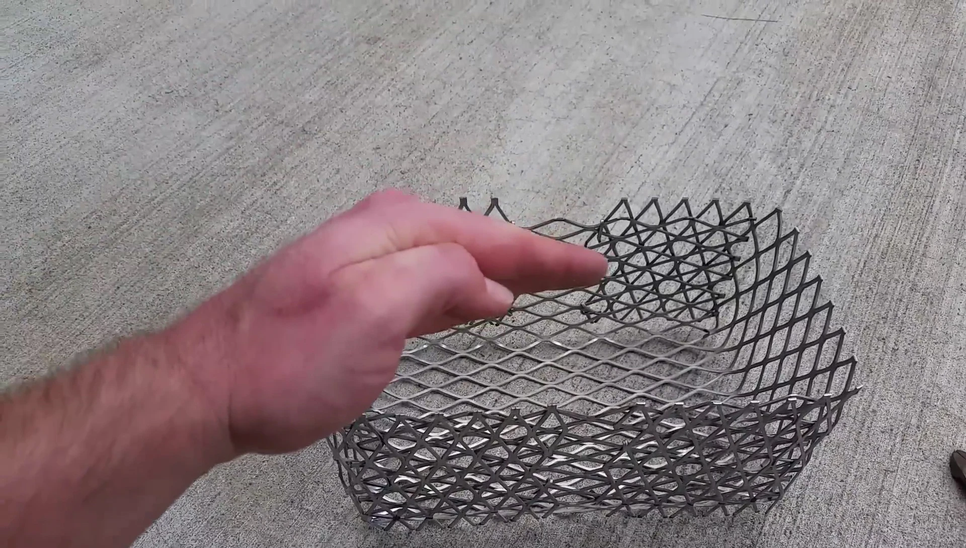 Folding the sides to create the base.