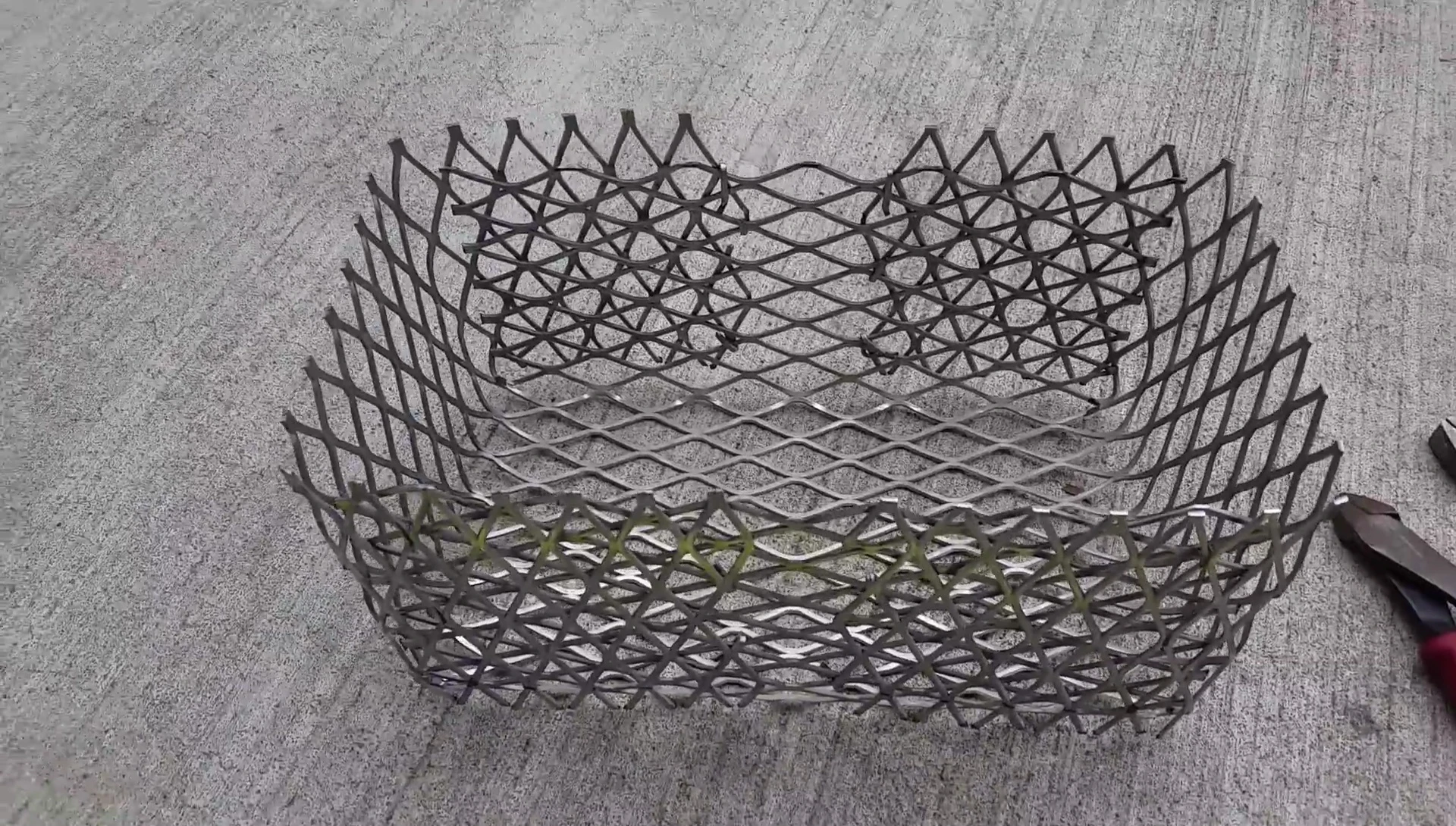 The finished charcoal basket.