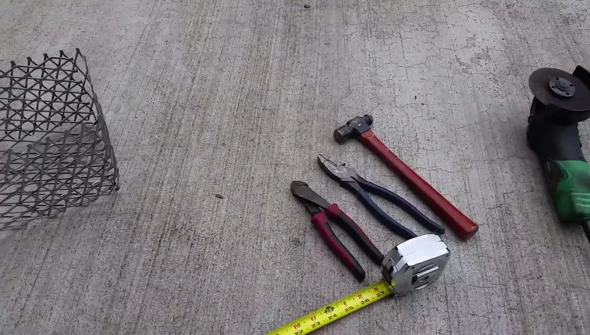 Hammer, tape measure, and linesman's pliers.