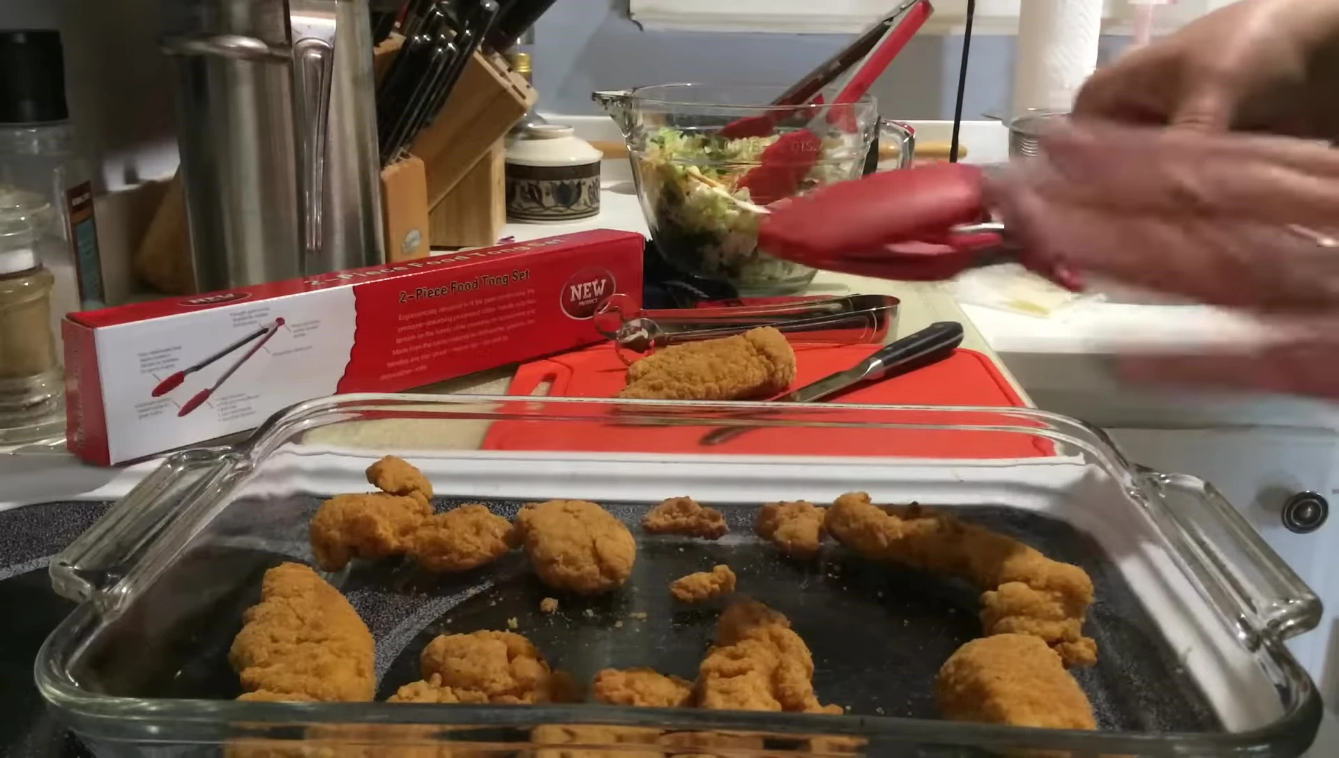 The tongs shown being dishwasher safe