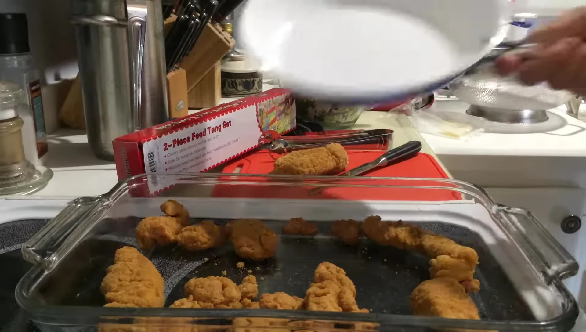 Mention of using the tongs with ceramic cookware.