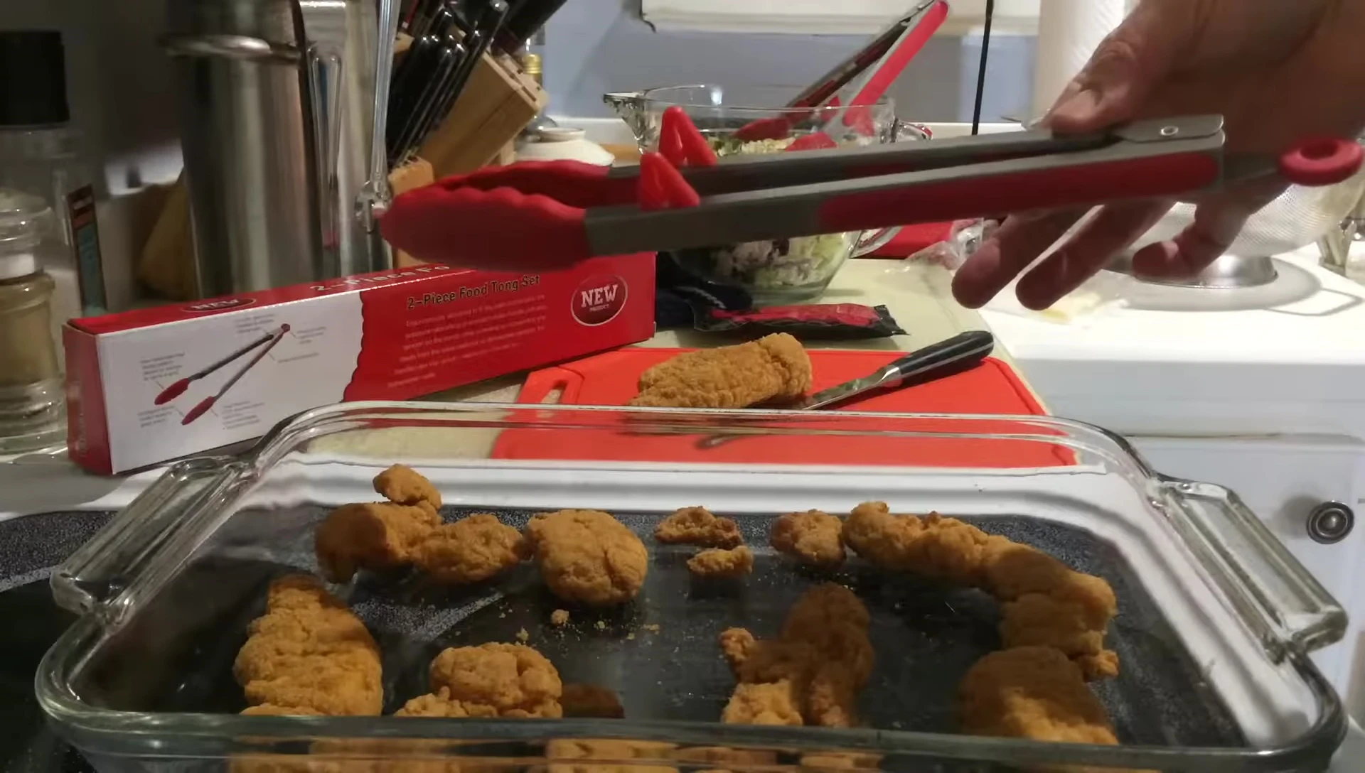 Tongs shown locked together for storage.