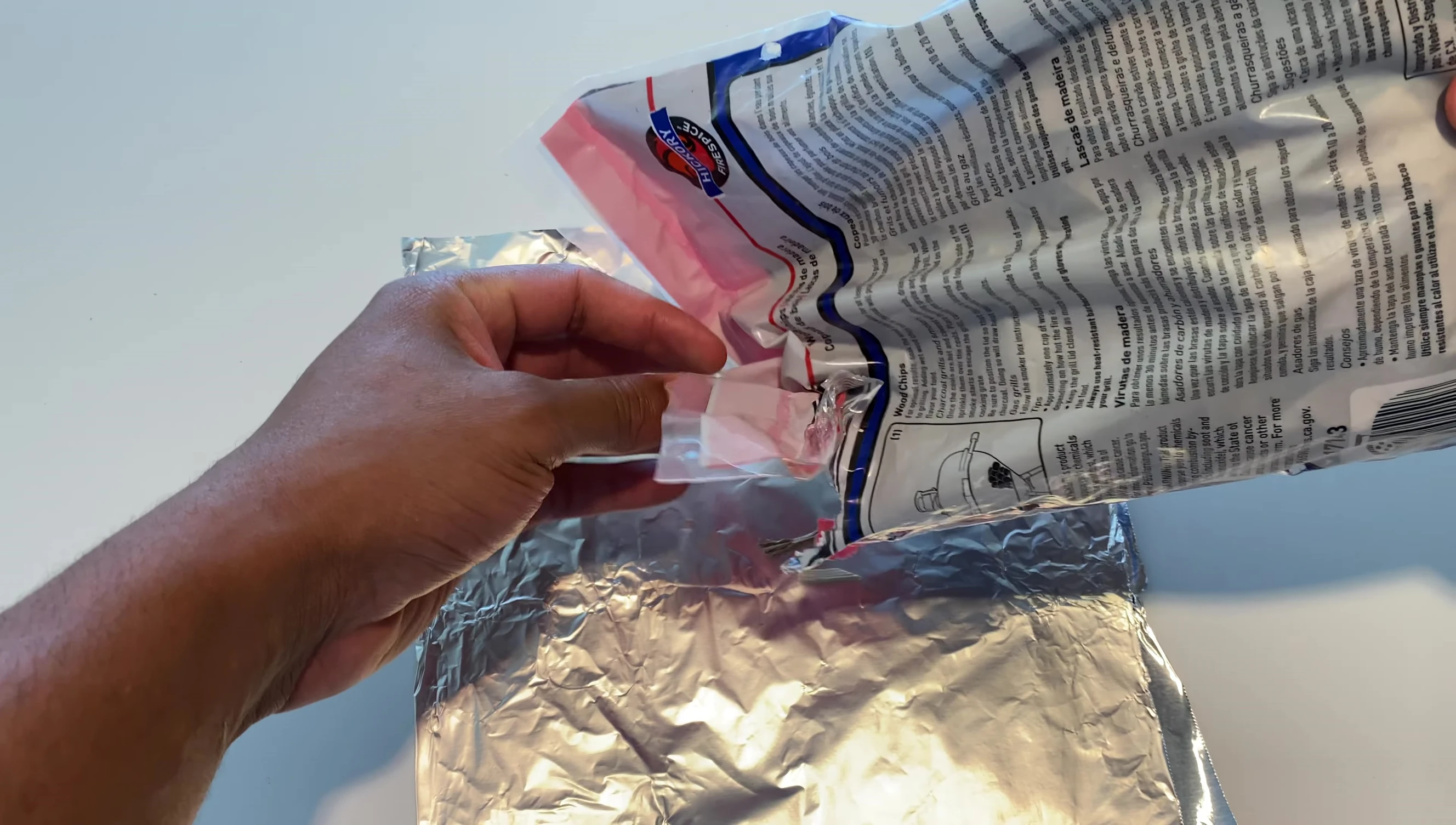 Adding wood chips to the foil.