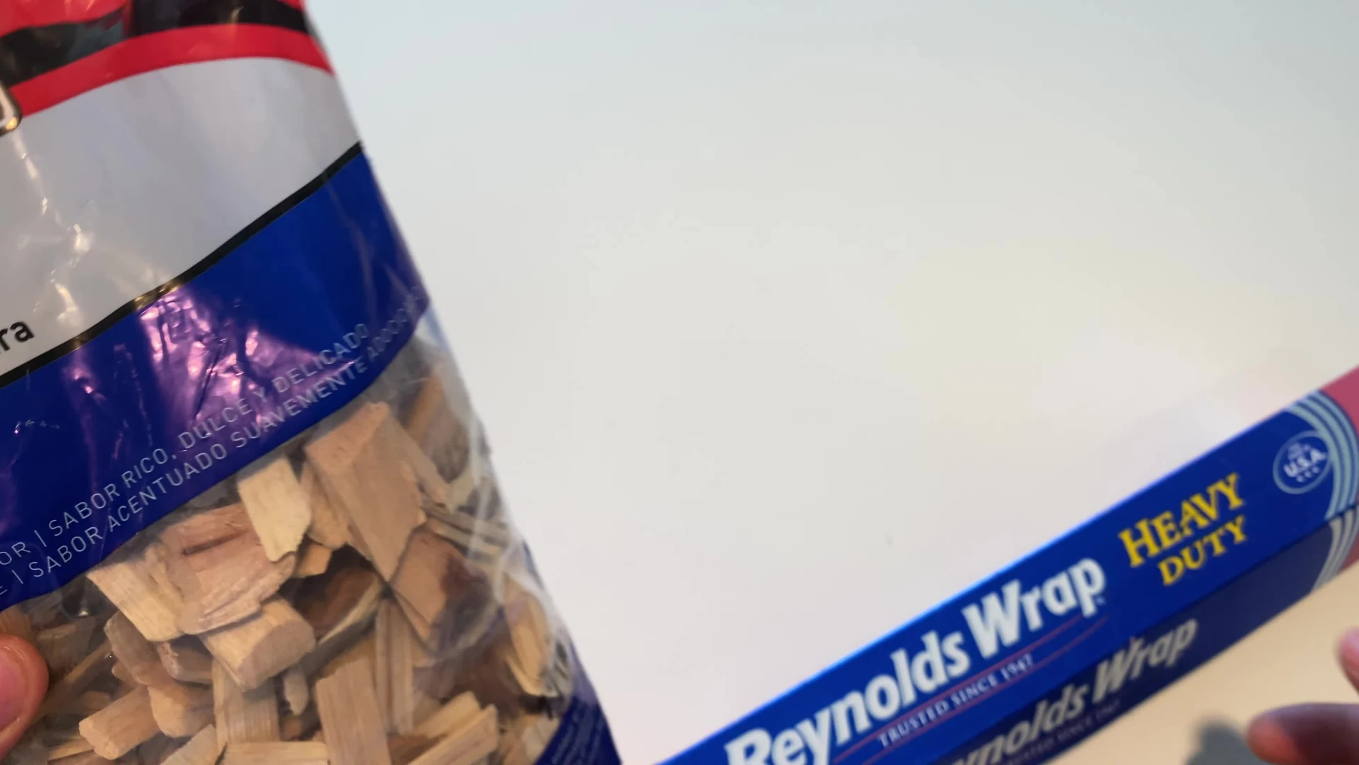 Close-up of wood chips and aluminum foil.