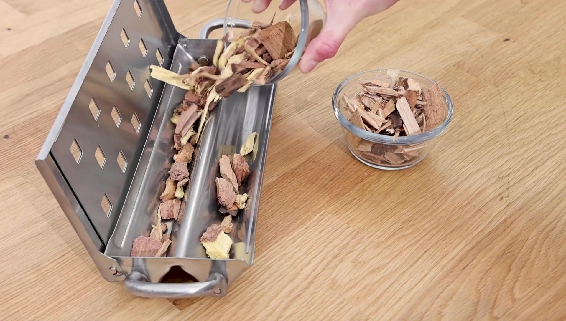 Grilling food using wood chips