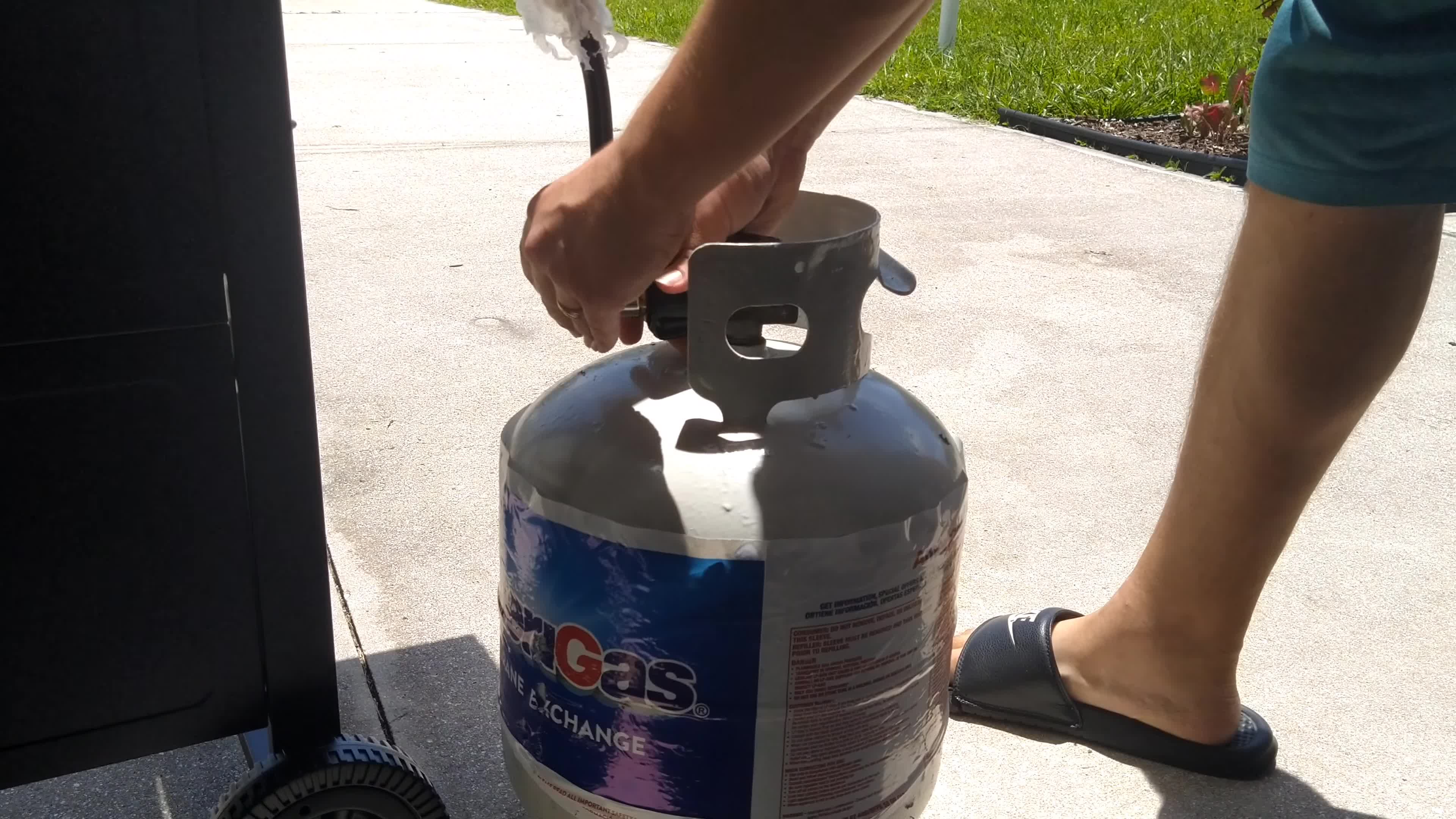 Connecting the propane tank to the grill