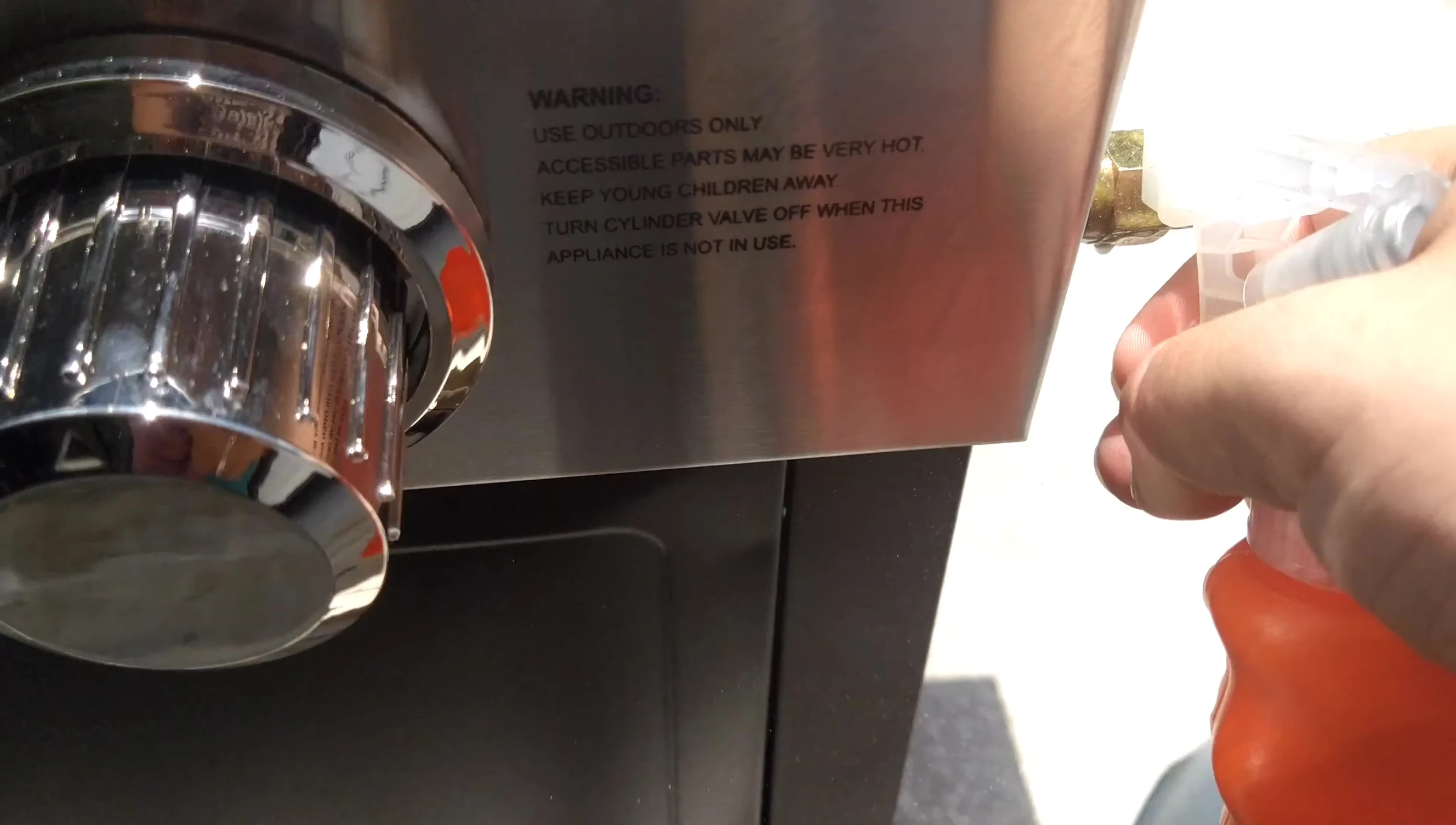 Checking for leaks with soapy water