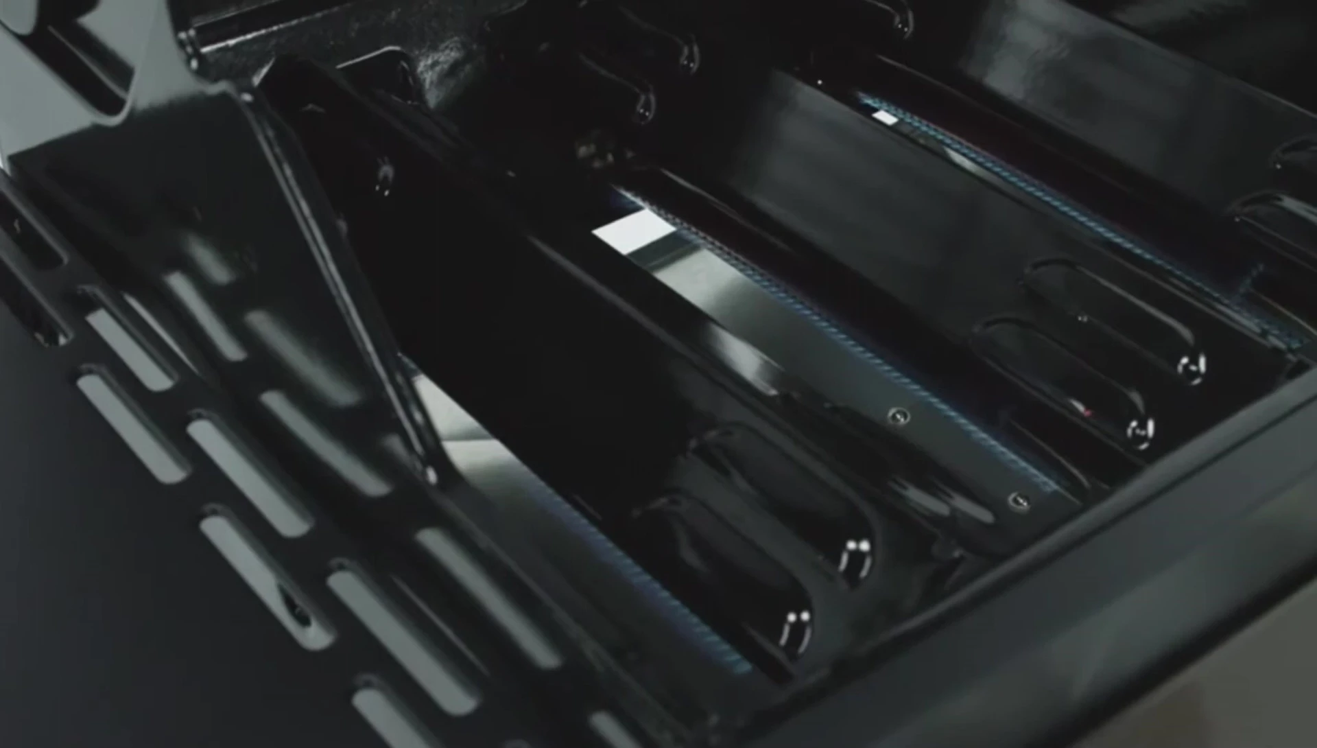 Detail shot of the grill's burners and heat tents