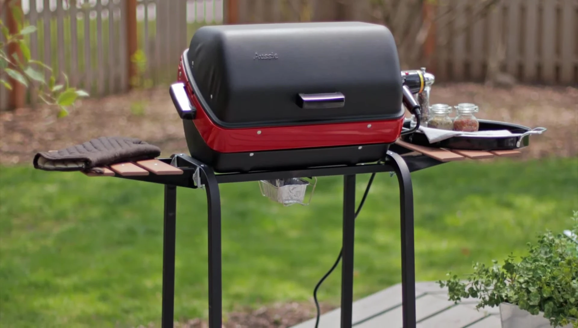 The Mecco grill showcasing its rolling cart design
