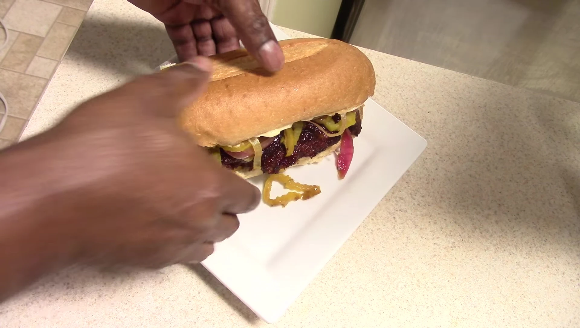 Taking a bite of the sandwich