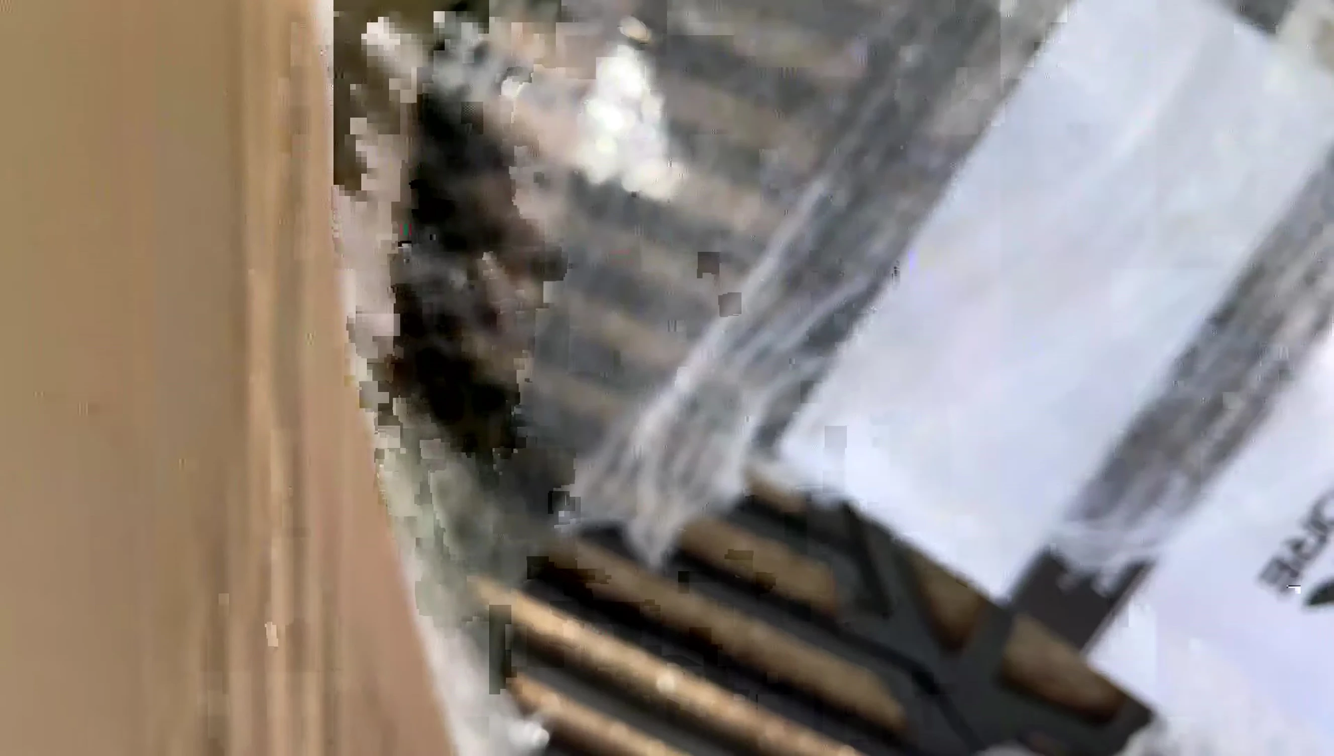 Close-up shot of the removable center section of the grill grate.