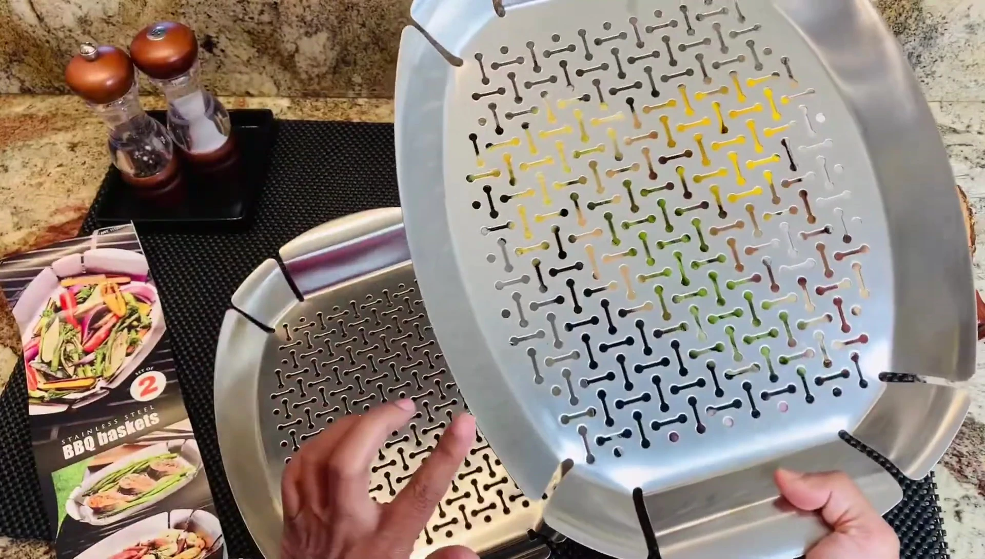 Close-up of the two stainless steel baskets