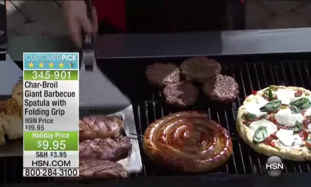 Presenter flipping three large steaks at once