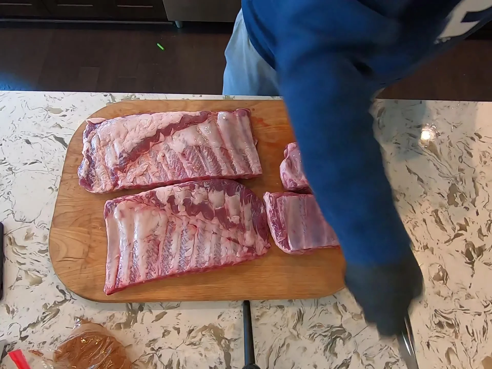 Demonstrating the use of a knife to remove the membrane.