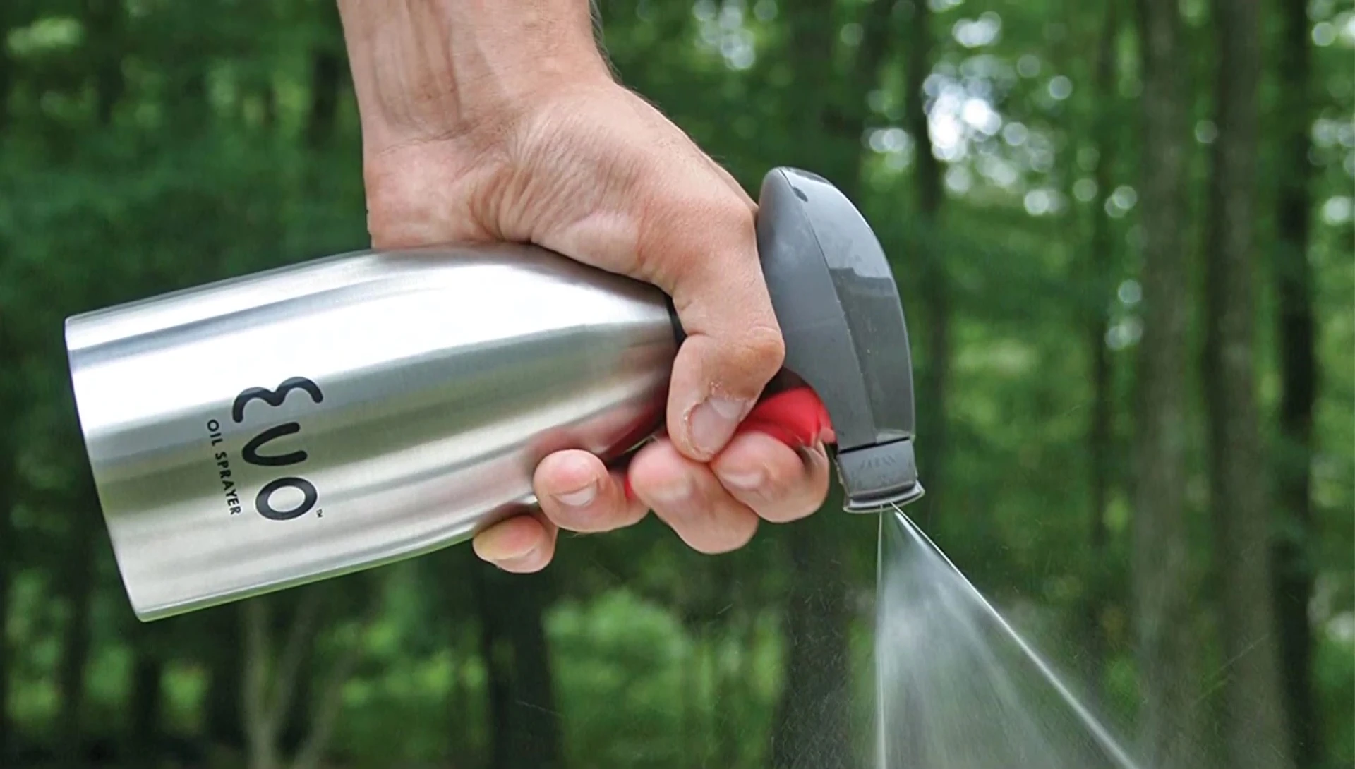 Showing the ergonomic trigger and spray pattern of the Achai C sprayer.
