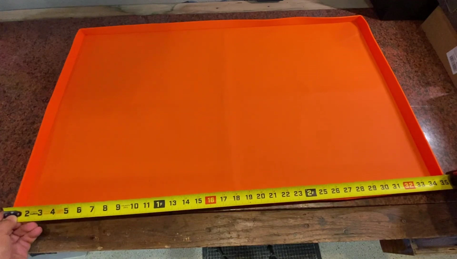 Close-up shot showing the width of the griddle mat.