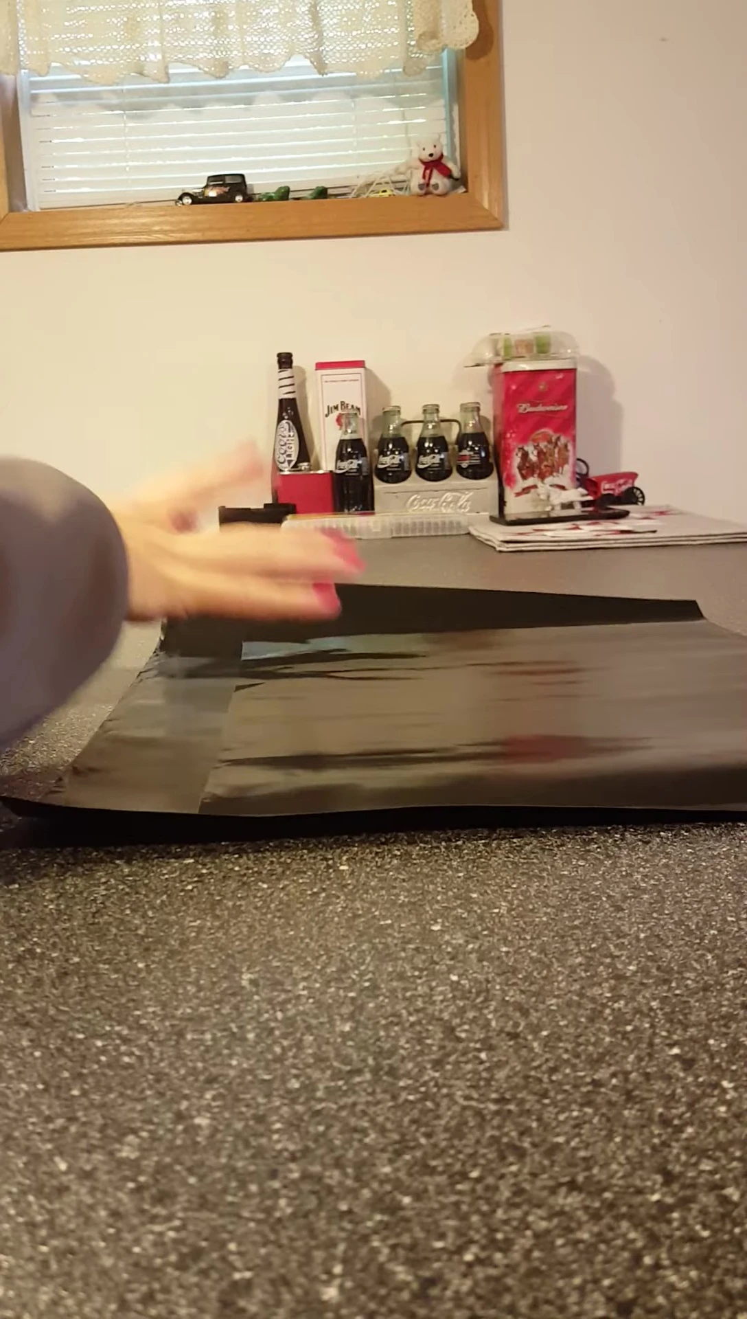Wiping clean the Wonder Grill Mat