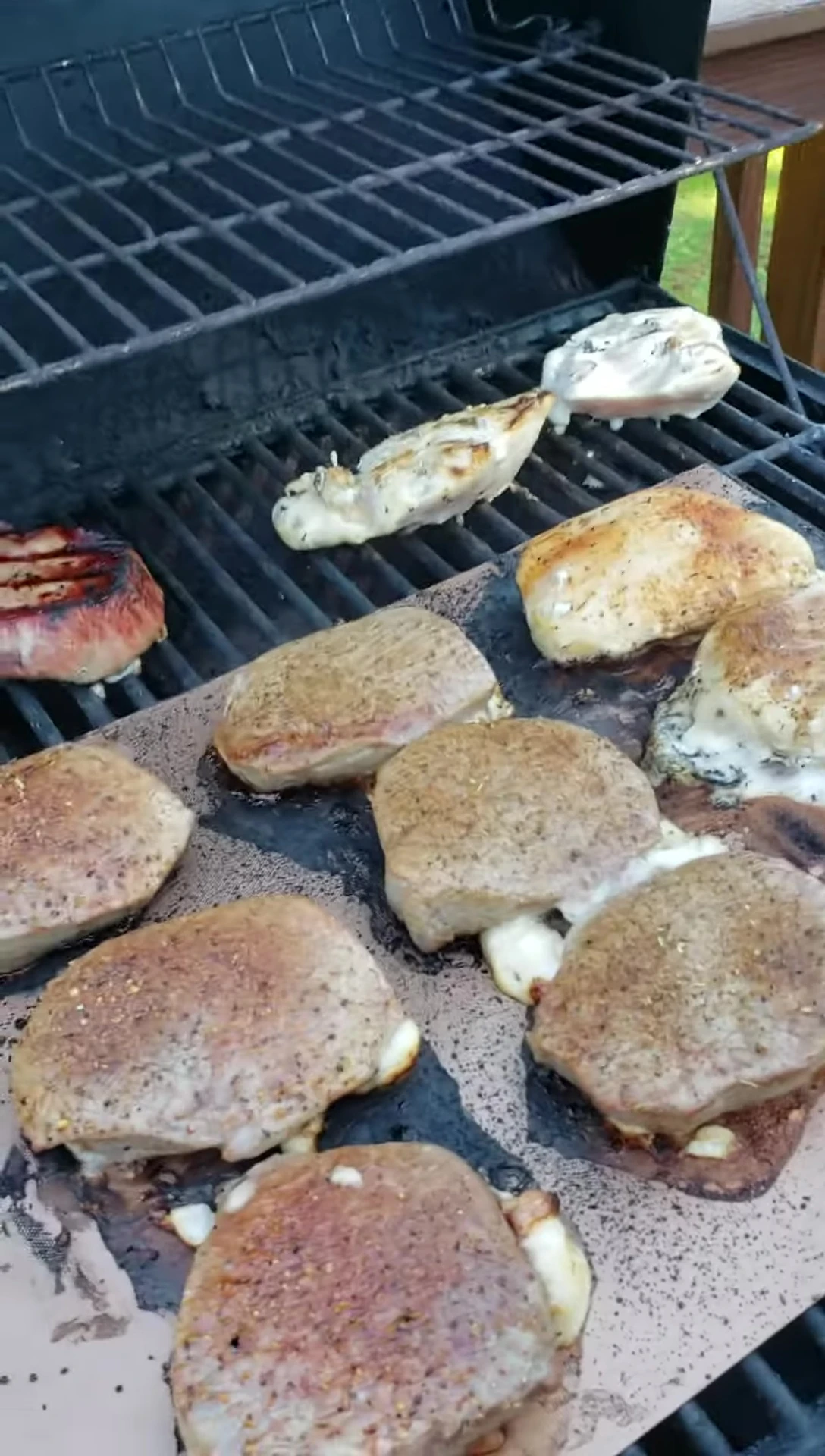 Checking the cooked food for grill marks.