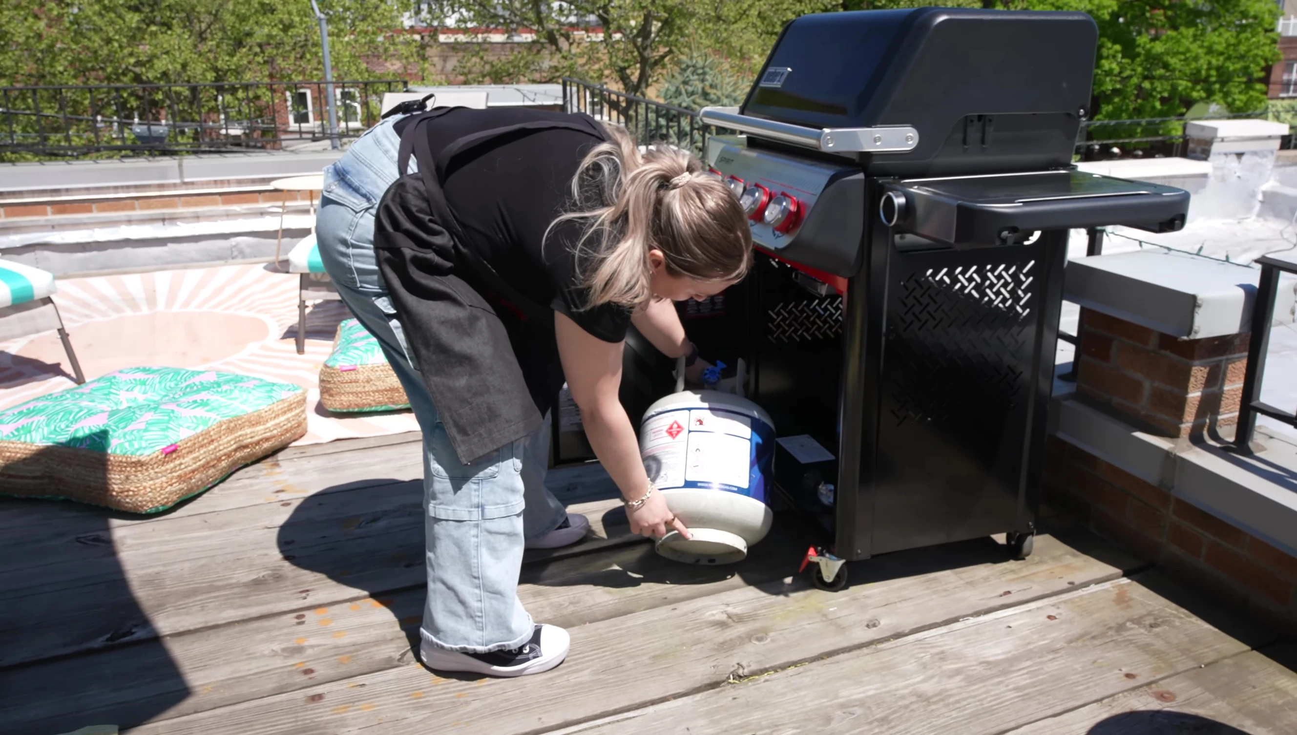 Propane tank storage inside the grill