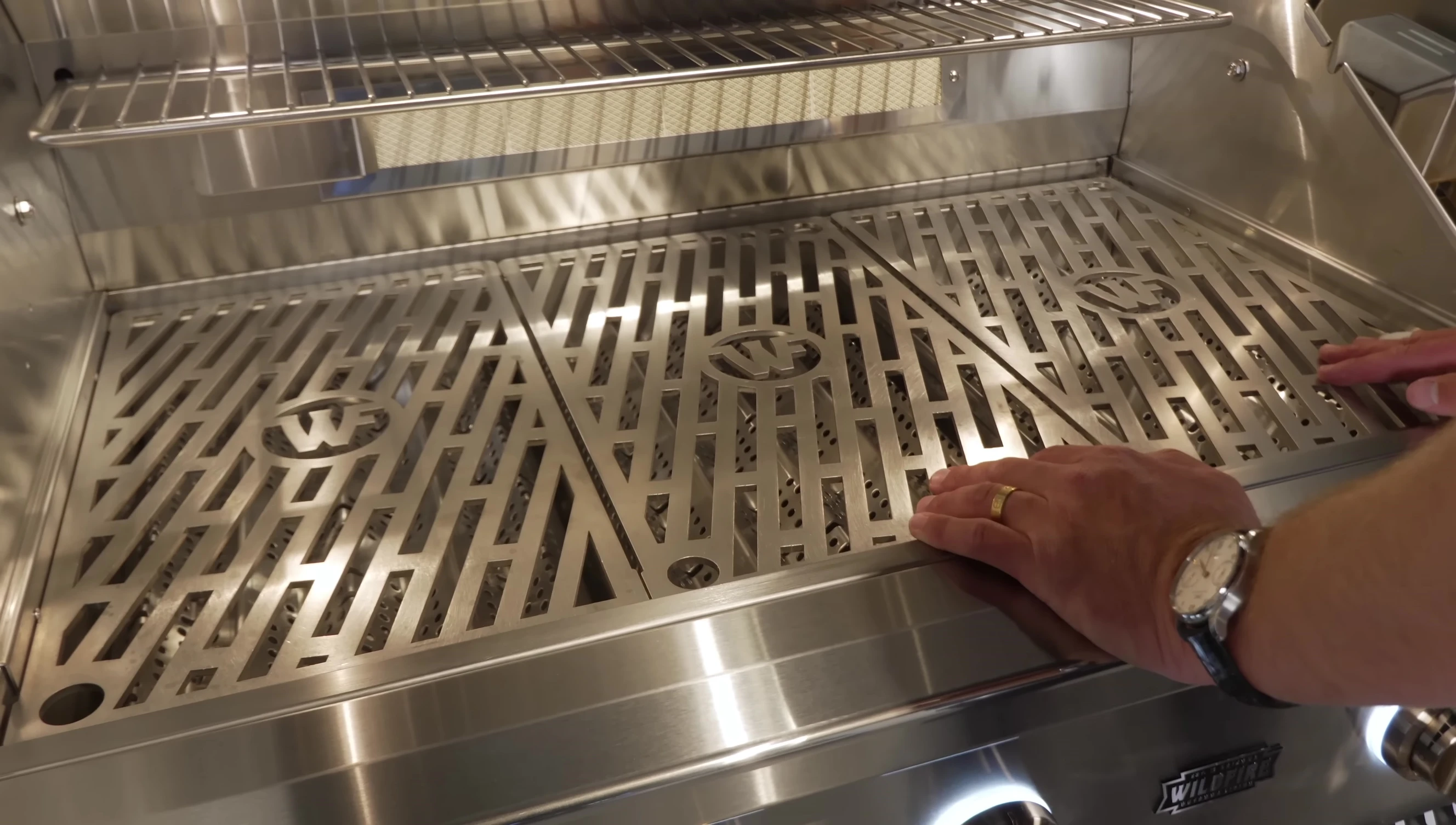 A view highlighting the firebox depth and burner placement.