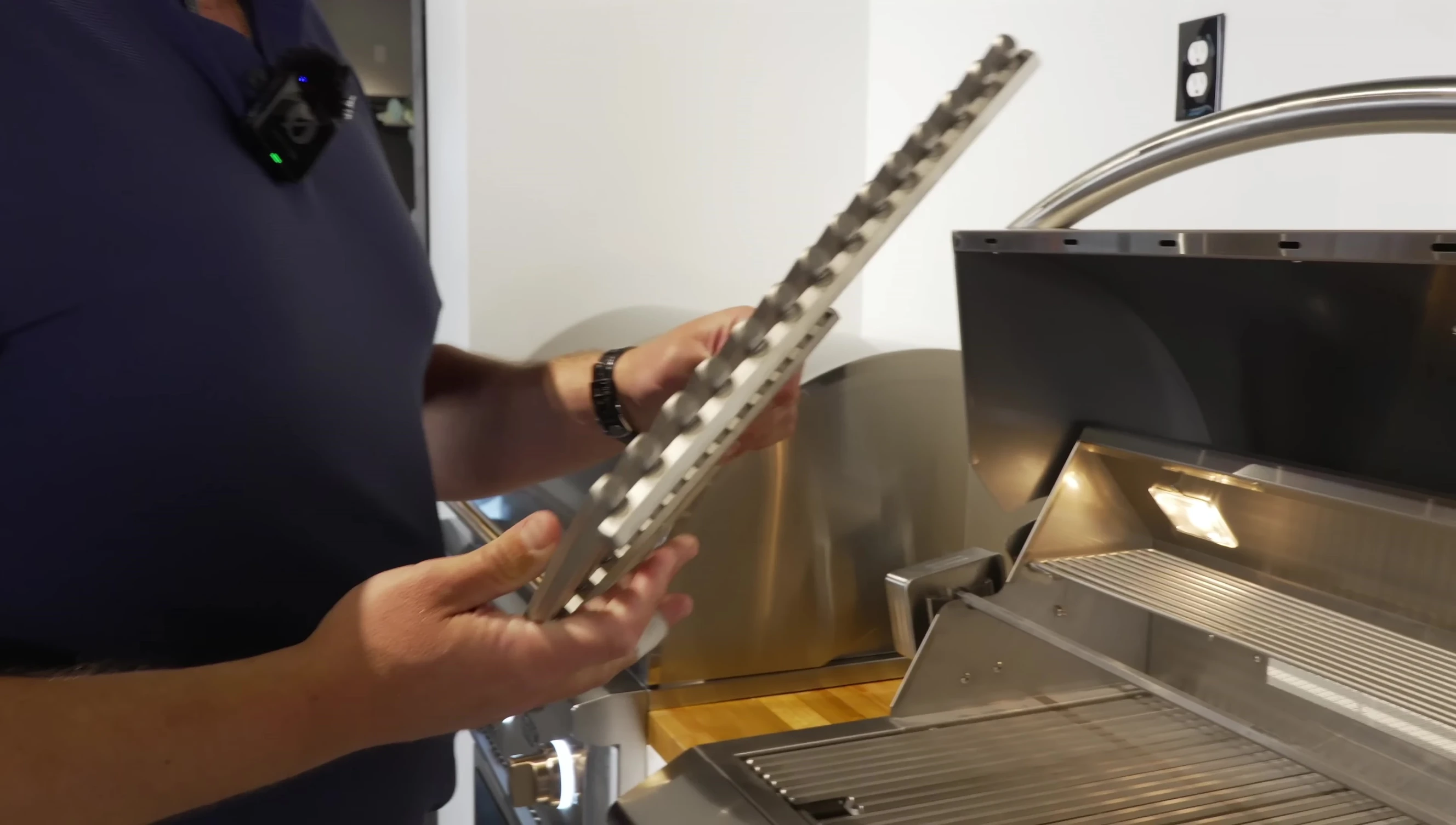 Image showing the interior lights and rotisserie of the Blaze Pro grill.