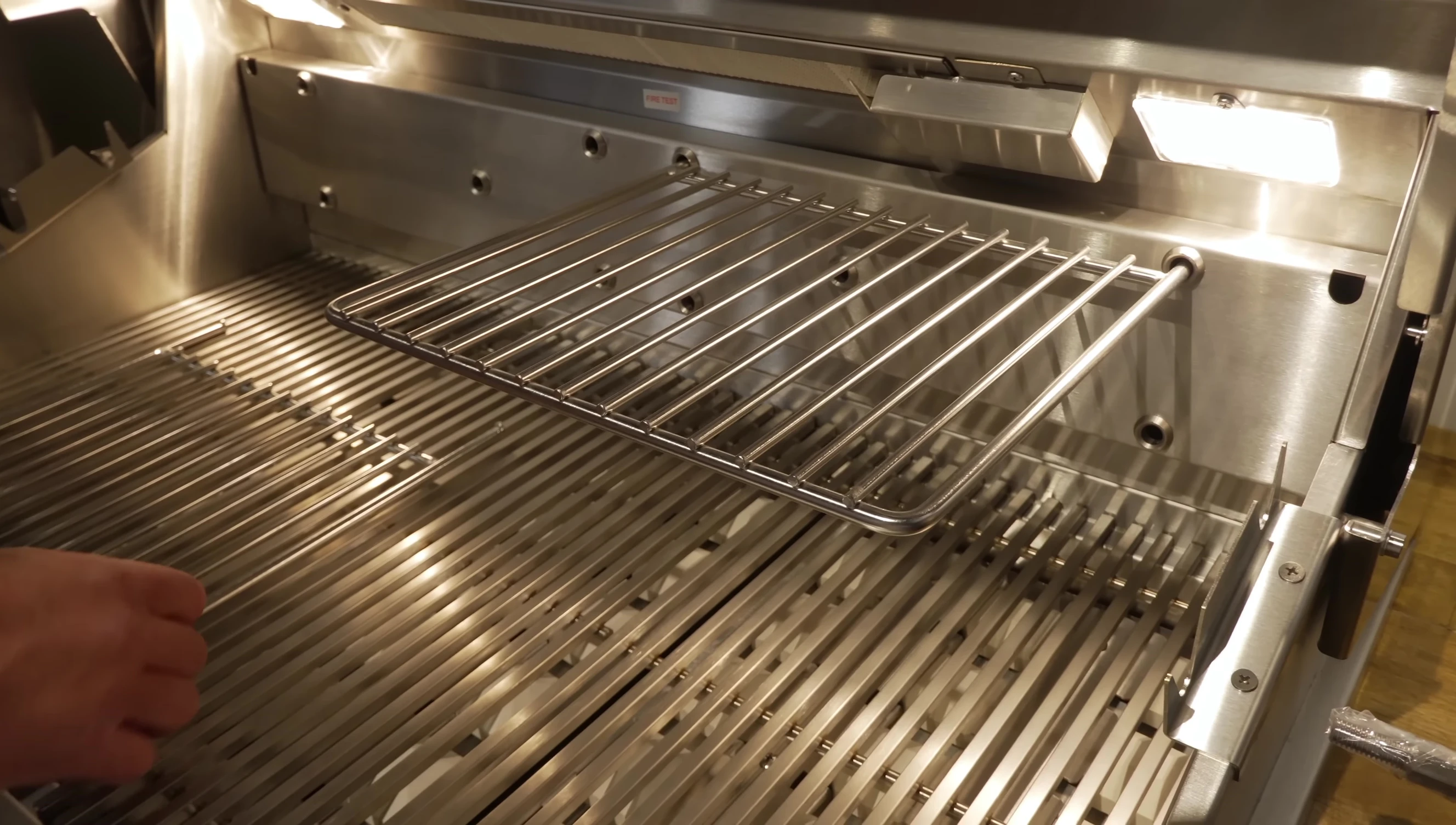 Close-up view of the unique warming rack design.