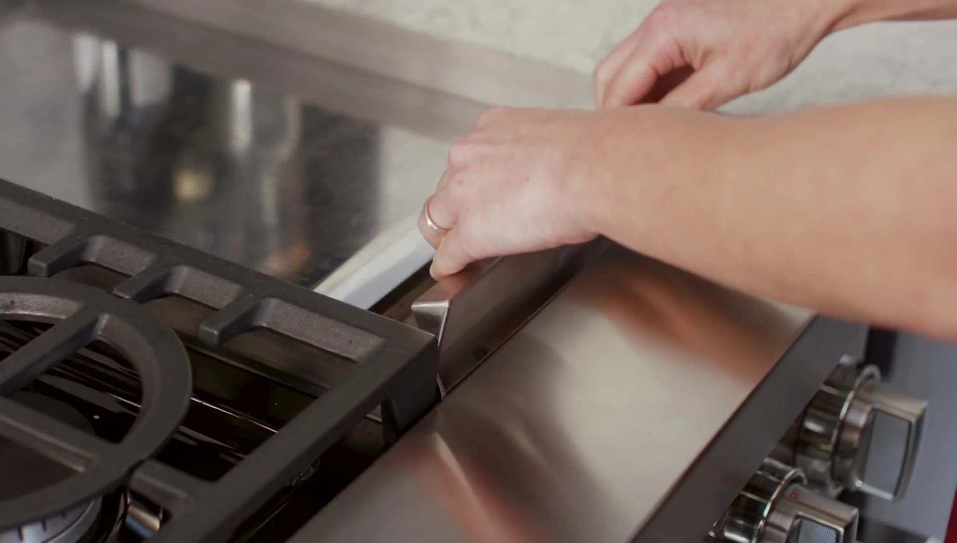 Cleaning the drip tray.