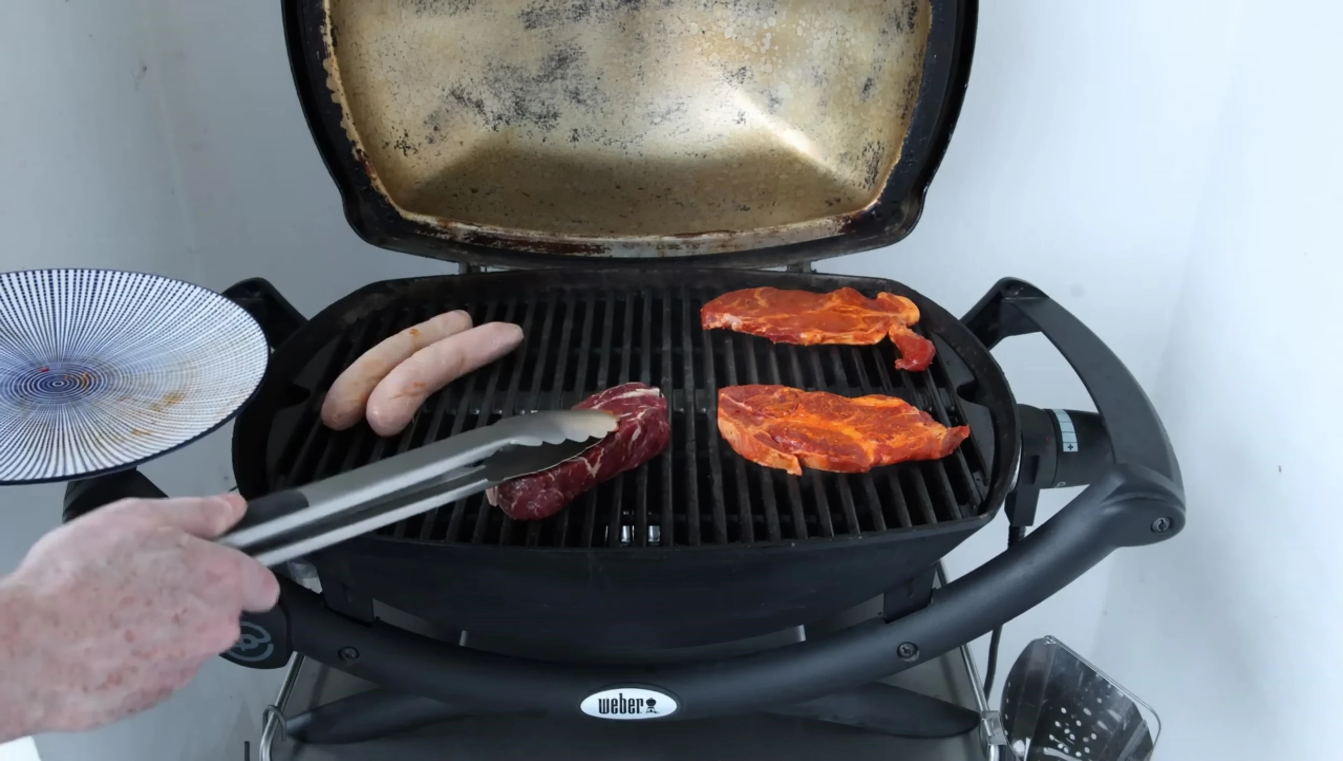 The food is cooking nicely on the grill.