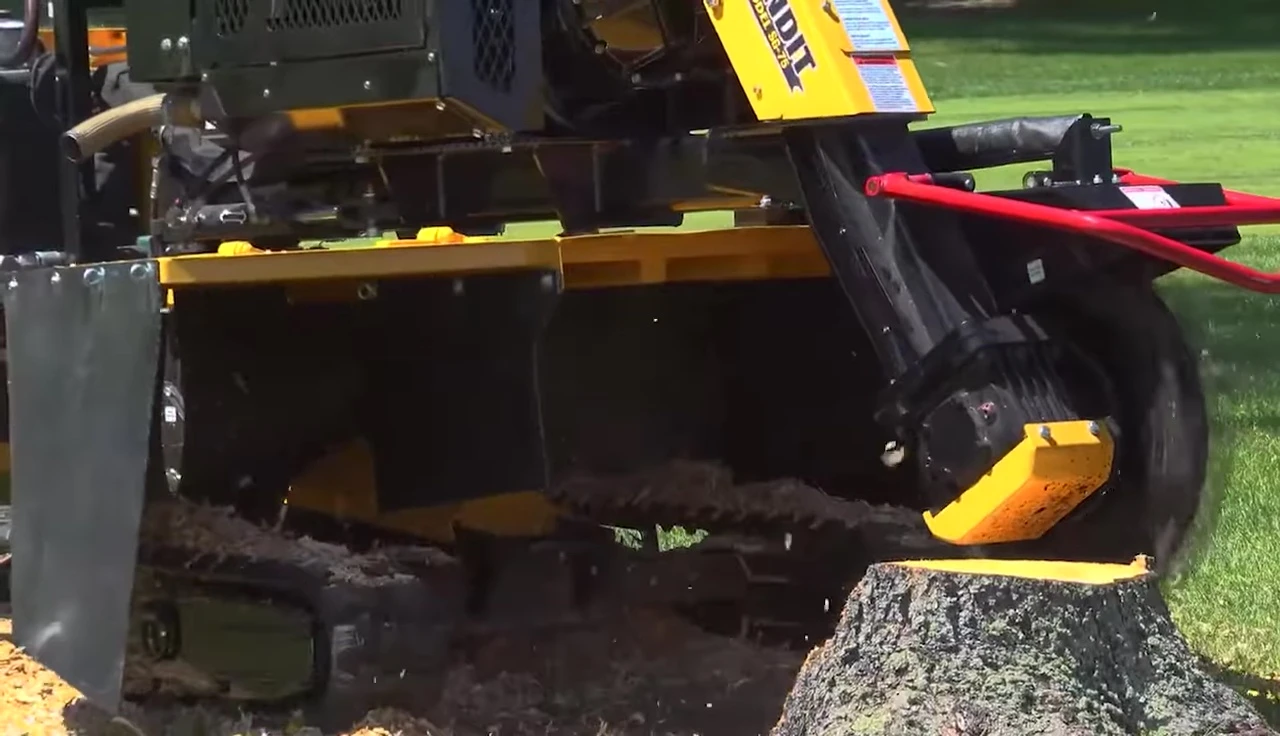 The Bandit 30090 Trackhole tree chipper operating in a challenging environment.