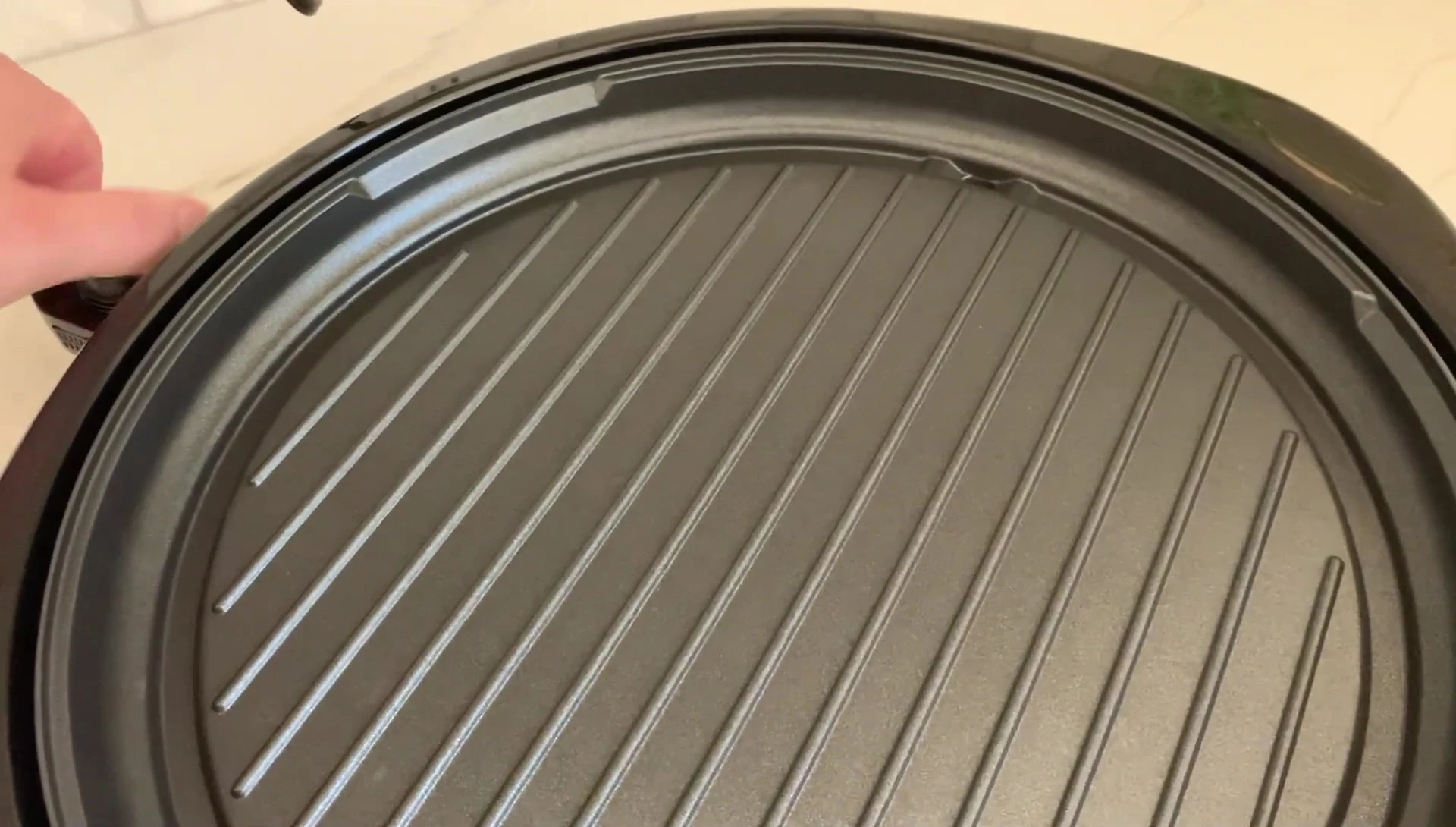Temperature display showing the grill reaching a high temperature in a short time.