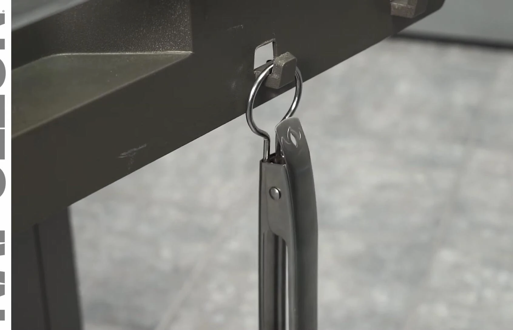 The Spatutong hanging on its convenient storage hanger.