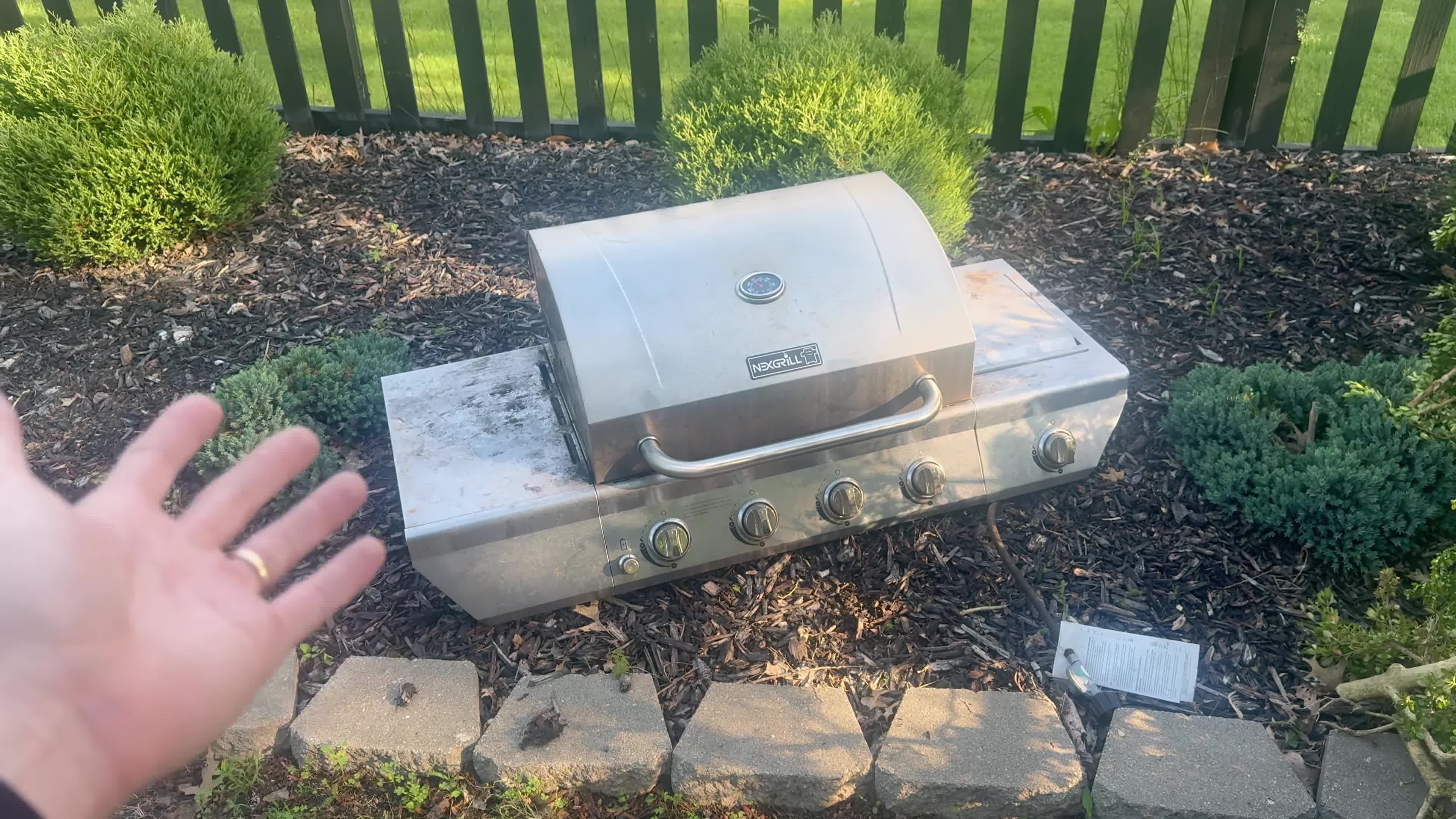 Initial shot of the grill, likely showing the grill box or the grill when it was new.