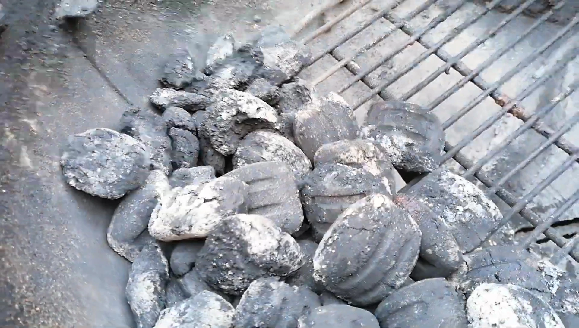 Weber briquettes remaining in the grill after a 10-hour cook.