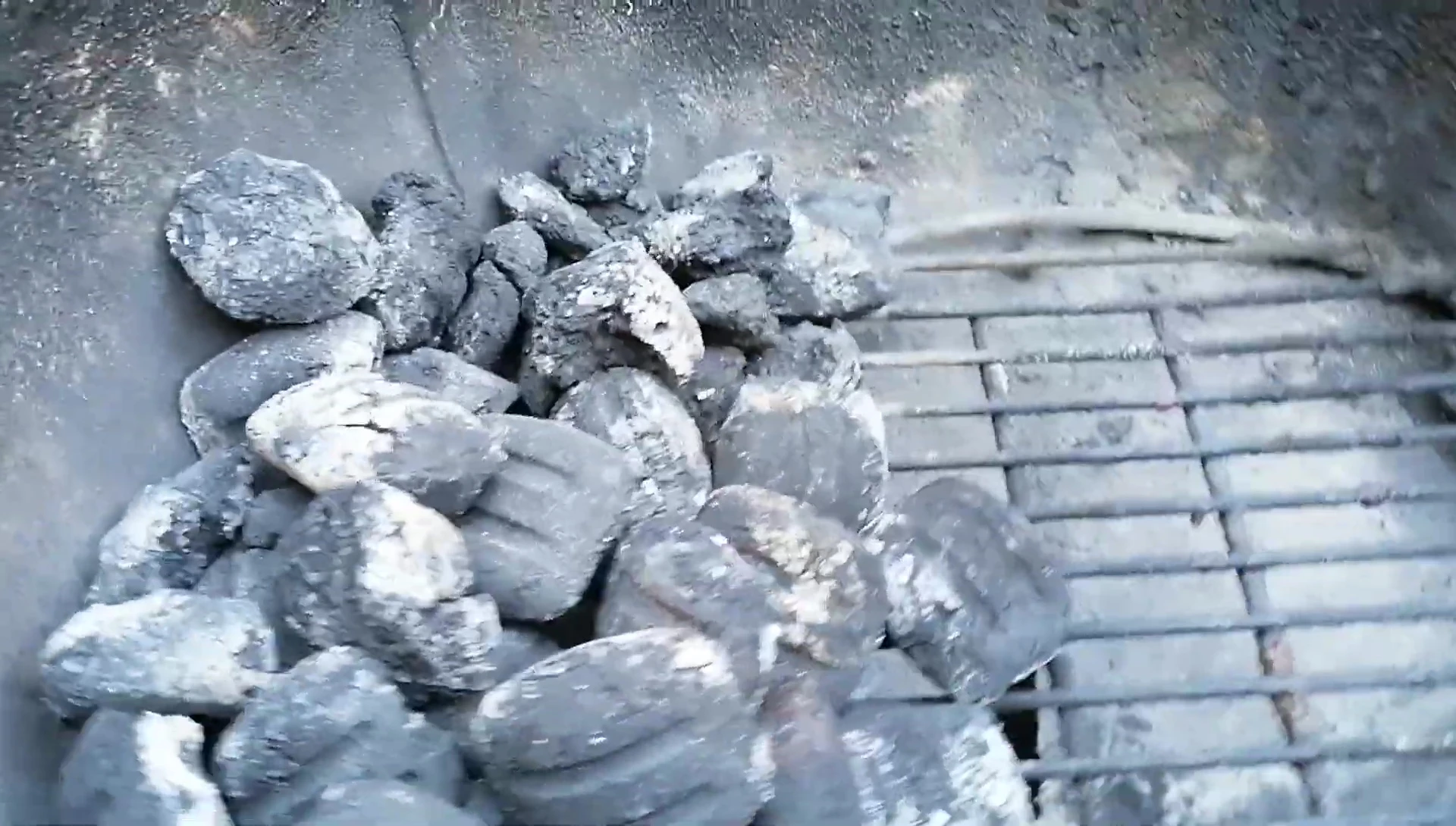 A view of the remaining Weber briquettes in the grill.