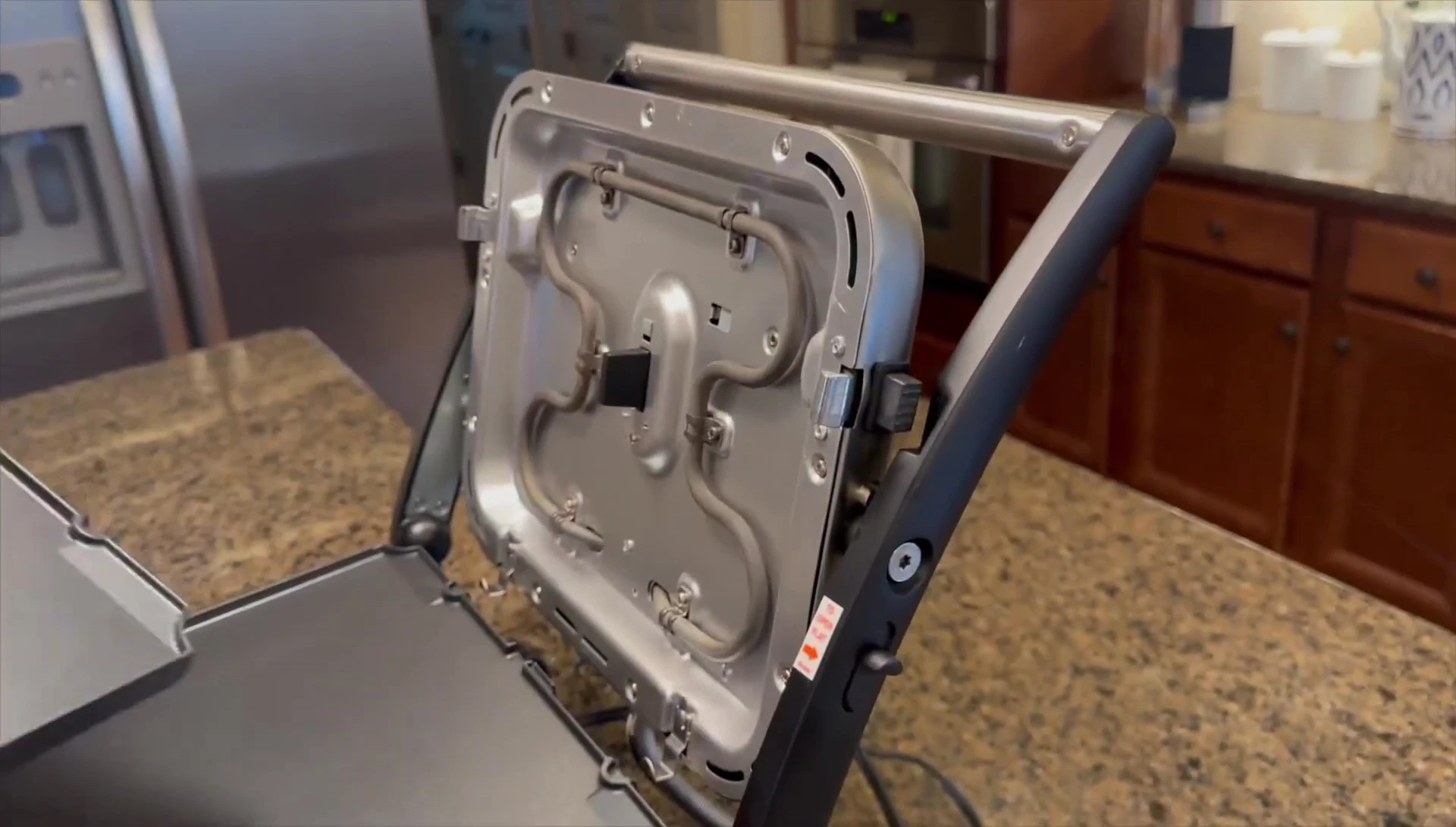The Griddler used as a griddle, cooking various breakfast items.