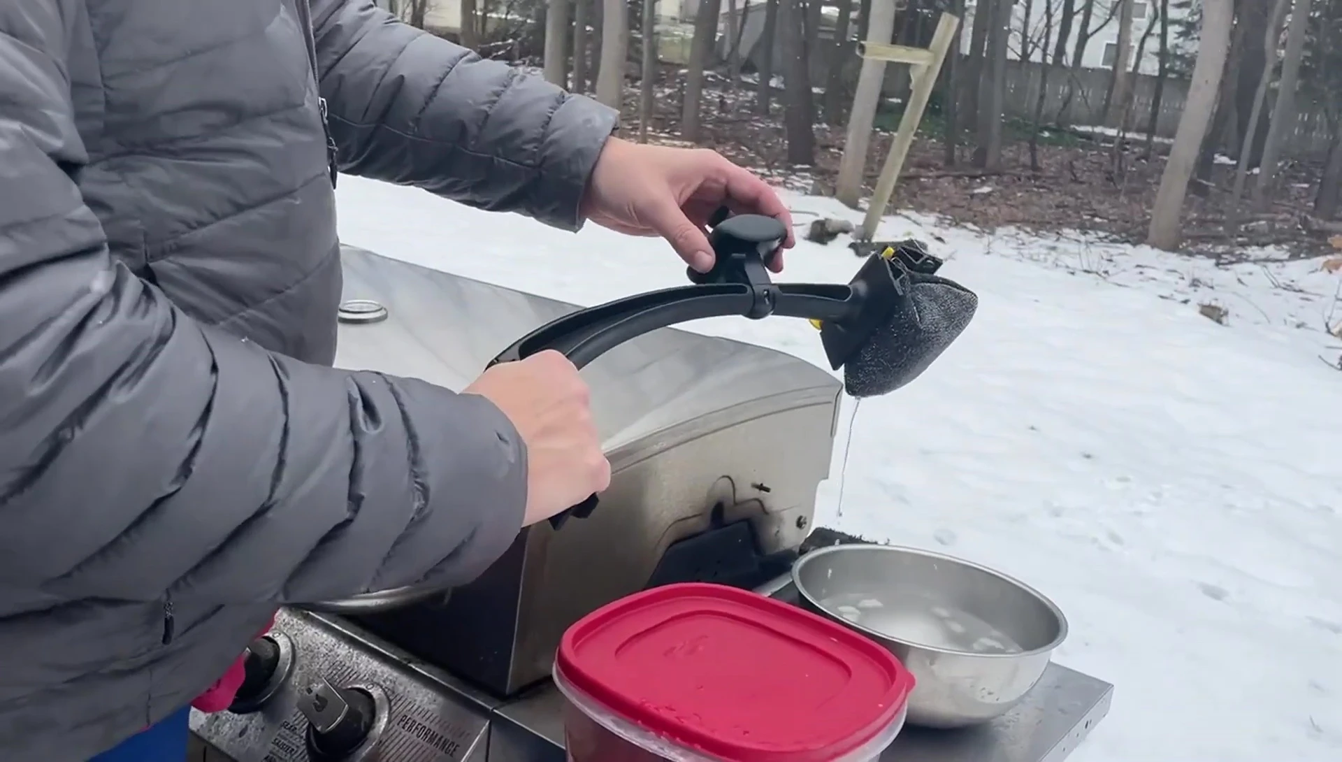 Demonstration of soaking the brush in cold water.